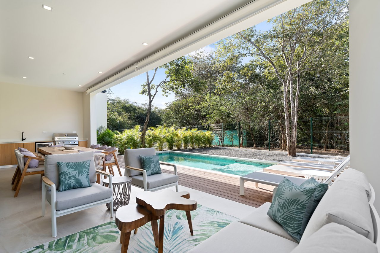 Villa Tropical Dawn | 4-Bedroom Modern Oasis in Bosques de Pinilla with Forest Views & Resort-Style Amenities