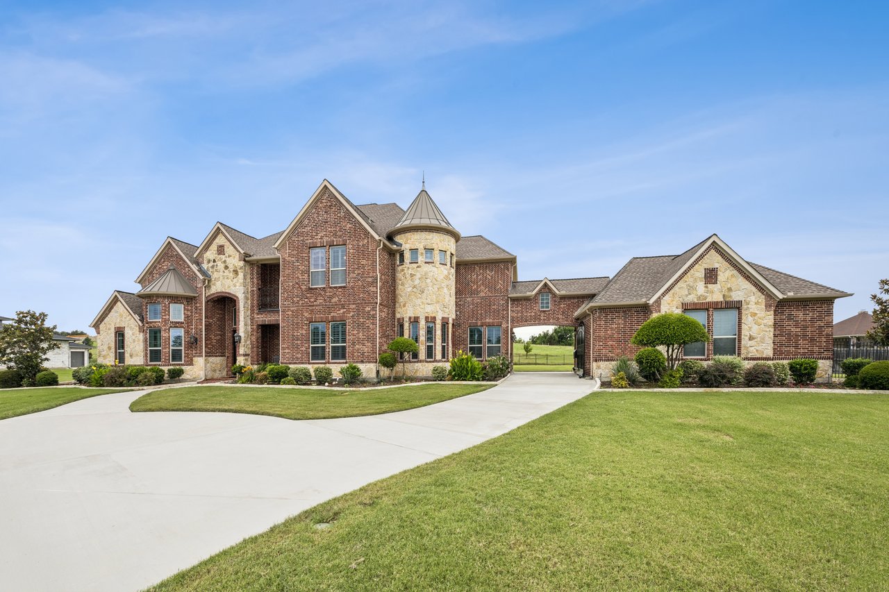 3.5 car garage and additional parking in back