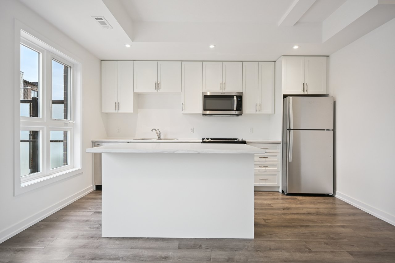 Brand-new, never-lived-in stacked townhome
