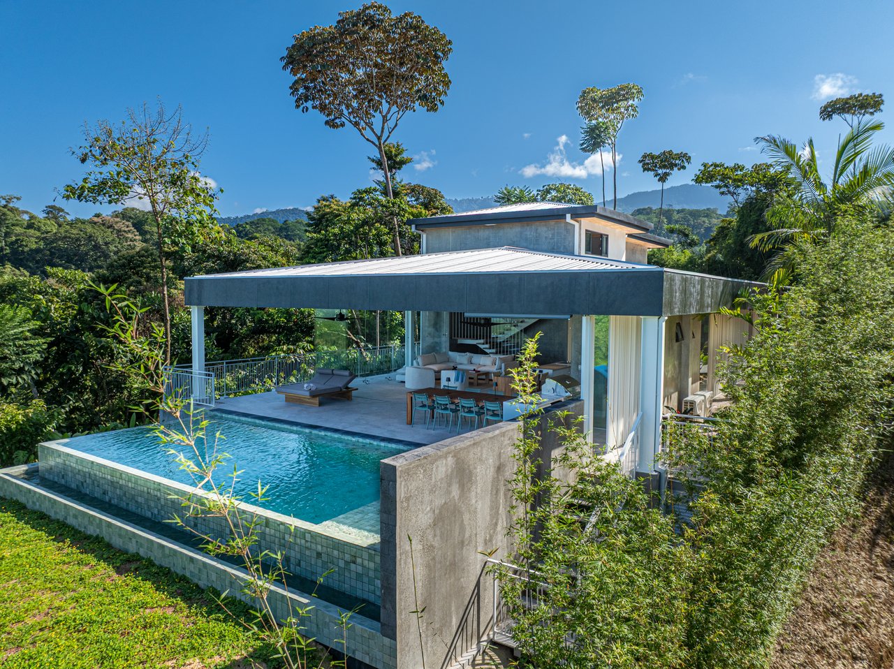 New contemporary tropical villa boasts with a movie theater and views of the iconic whale’s tail