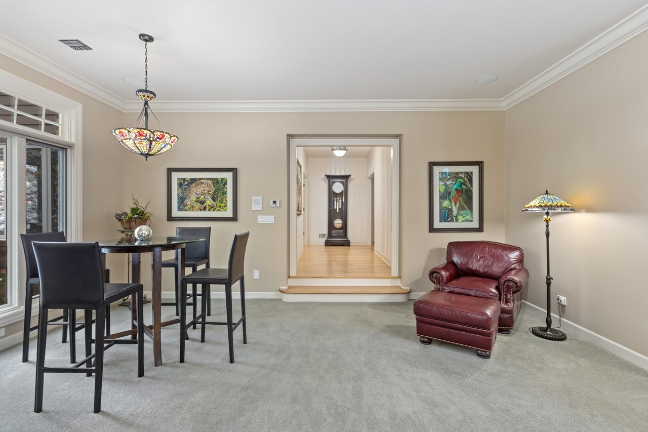 Beautifully Appointed Home in a Gated Community on Over an Acre of Professionally Landscaped Grounds with Pond Views