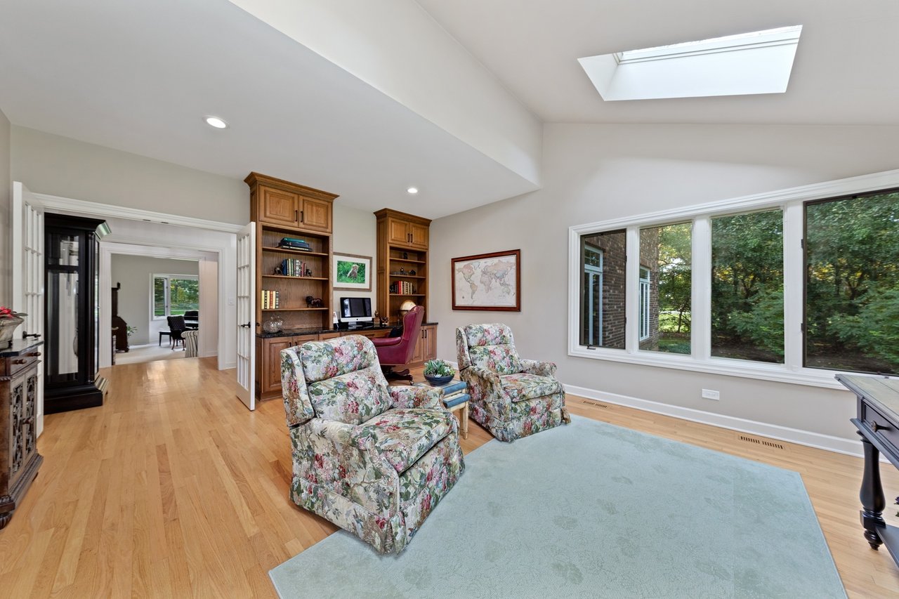 Beautifully Appointed Home in a Gated Community on Over an Acre of Professionally Landscaped Grounds with Pond Views
