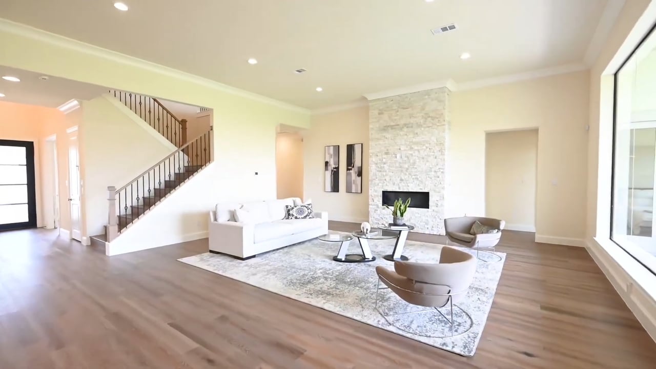 Discover Luxury Living: Modern Home with Lake View in Houston's Gated Community