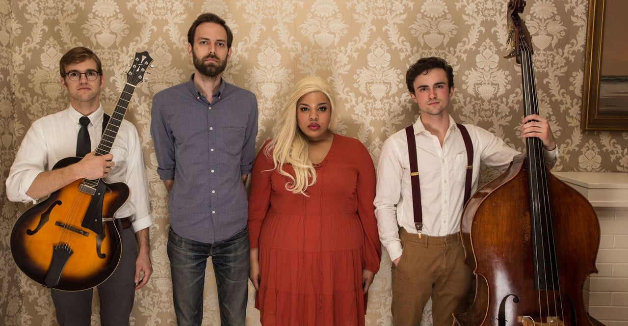 Group photo of the Nightingale Band who are a featured band at the Sweet Carolina Music Festival sponsored by Vignette Realty