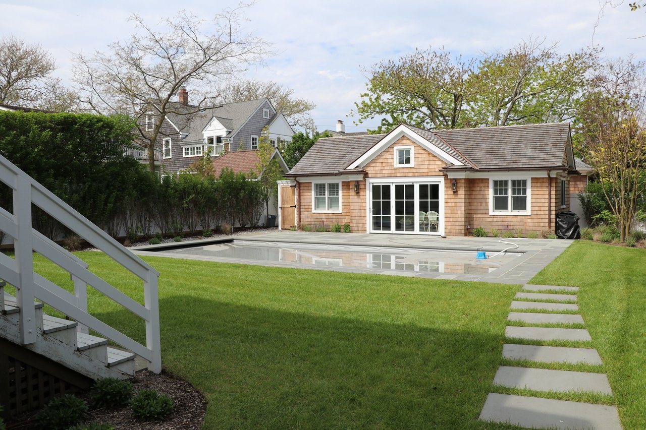 A Classic Bay Header with a Pool House