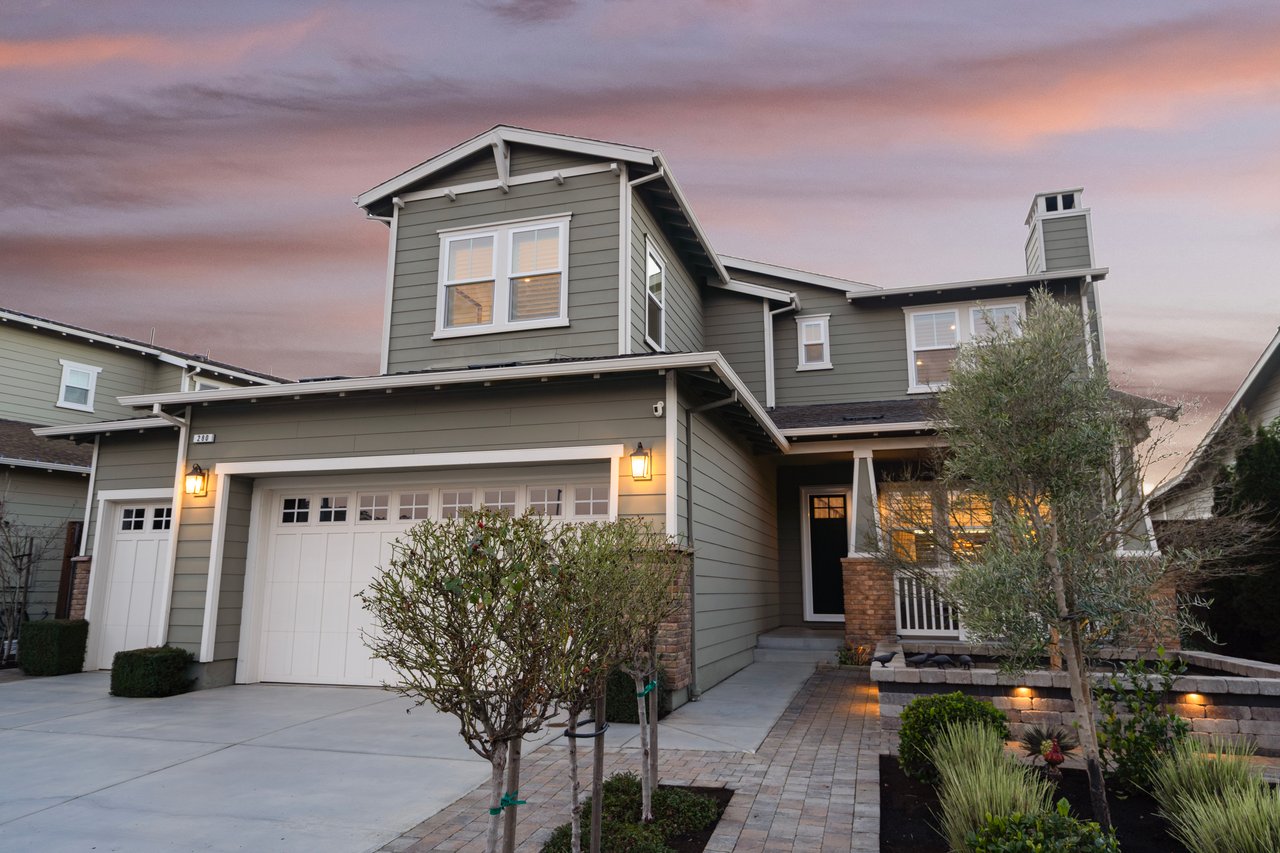 Front view of home showing dual-entry garage and curb appeal