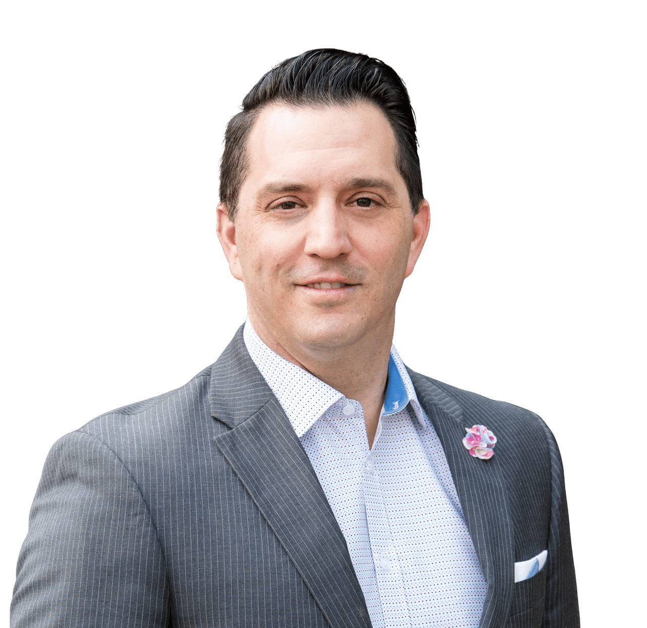 Curtis Tafoya in a gray pinstripe suit with a pink-and-white lapel flower