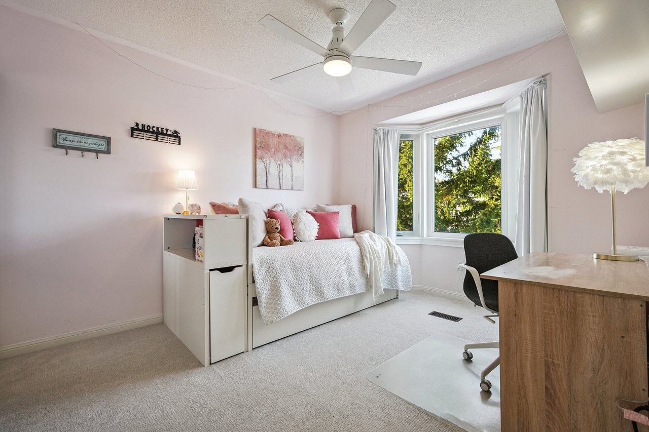 Sun-Filled Sophistication on a Rare Pie-Shaped Lot in West Oak Trails