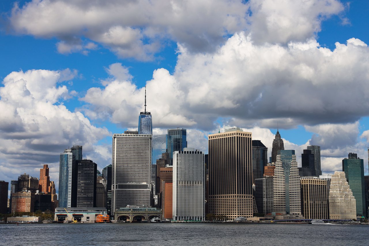 Explore the architectural history of Cedar Street in Manhattan's Financial District, including its colonial street origins, nineteenth-century commercial development, the rise of financial institutions, and the construction of monumental skyscrapers. Discover nearby landmarks such as Trinity Church, the Equitable Building at 120 Broadway, and One World Trade Center, along with the architectural transformation of Lower Manhattan.