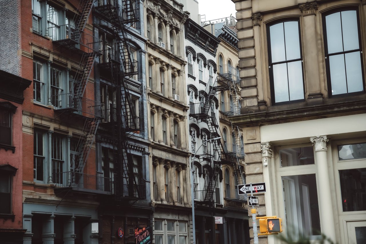Explore the Bowery's architectural history, including the Bowery Savings Bank, Germania Bank Building, Citizens Savings Bank, historic cast-iron buildings, and contemporary architecture.