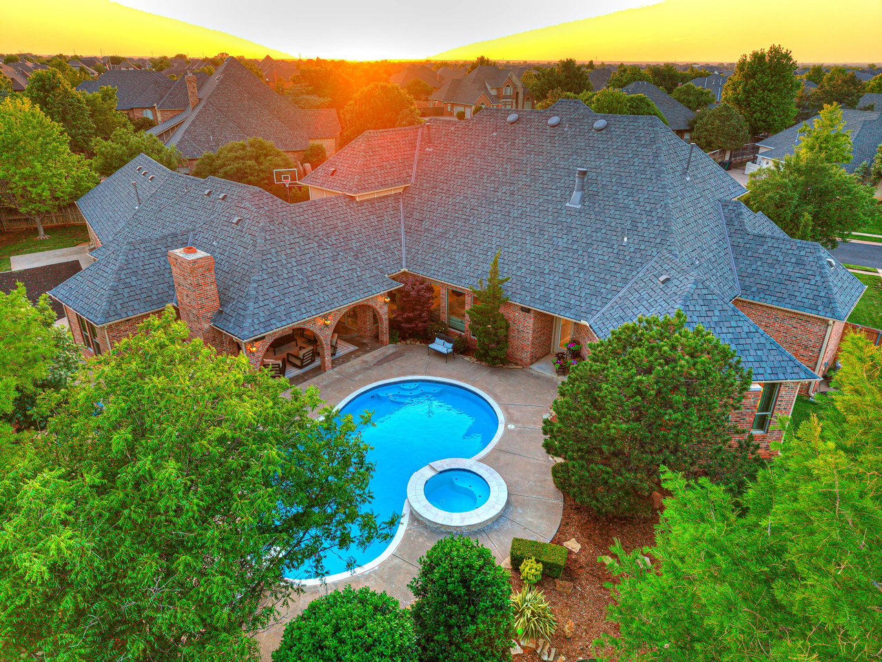Listing of the Week: The Home That Has Everything 8316 NW 125th Street, Oklahoma City | Gated Cobblestone Community - Wyatt Poindexter - The Agency OKC