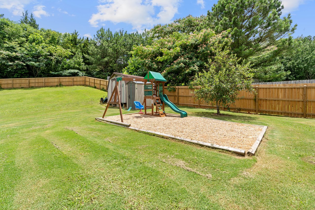 LOTS of Space both Inside and Outside!! Large Fenced in Backyard!