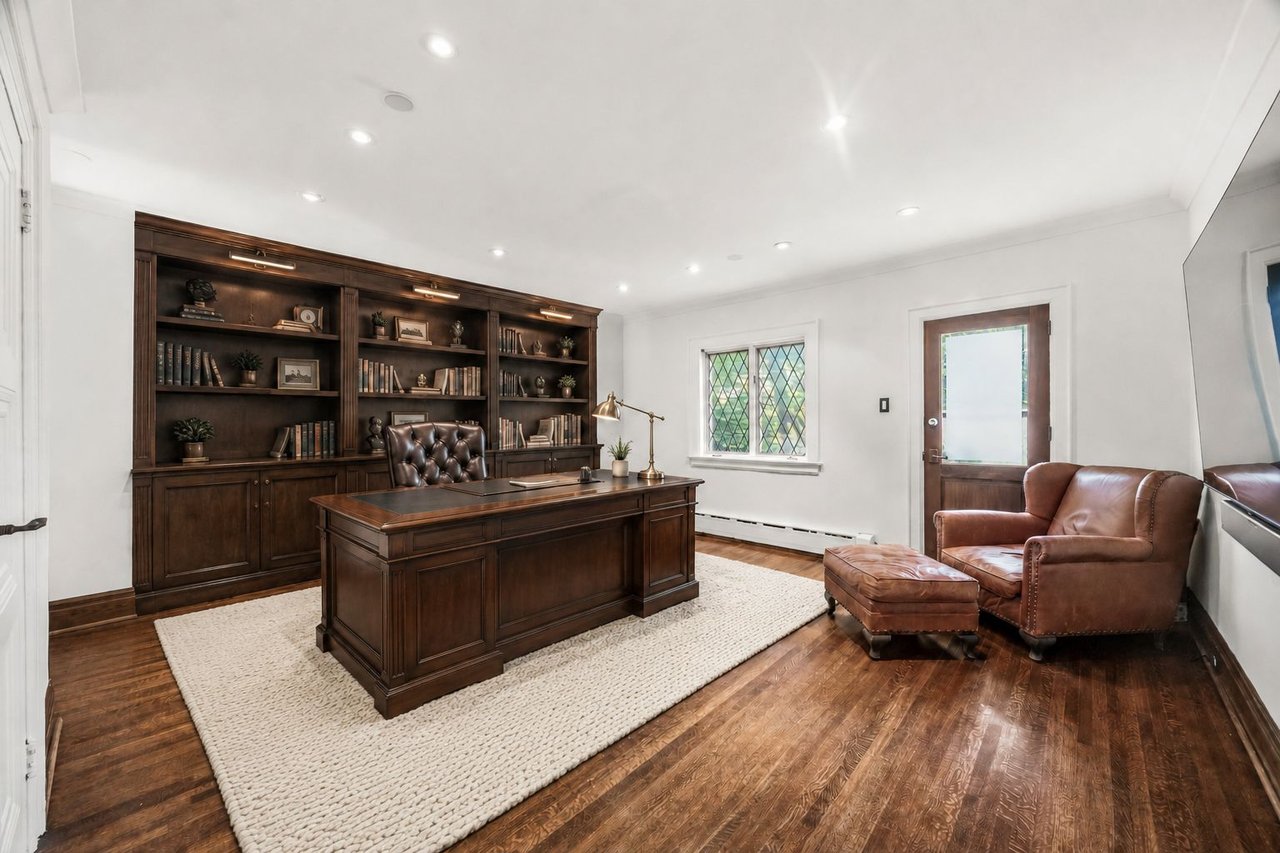 SOLD: Distinguished Centre-Hall Home