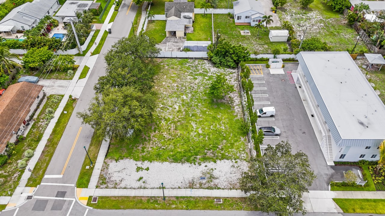 Aerial corner view of vacant lot at 248 SE 1st Ave, Delray Beach, Florida, ideal for a 3-townhome development in the heart of East Delray.