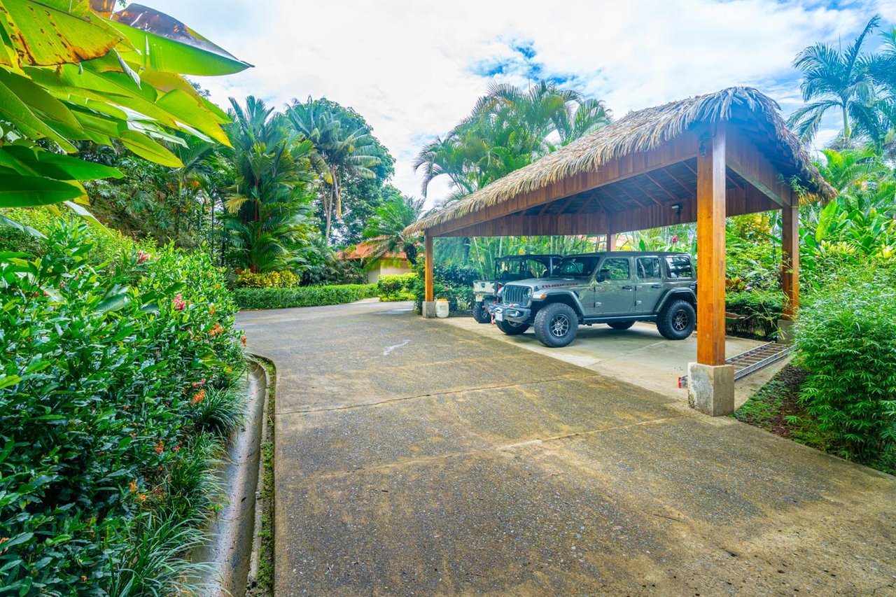 Ocean, jungle & mountain views on a meticulously landscaped 3-home family compound