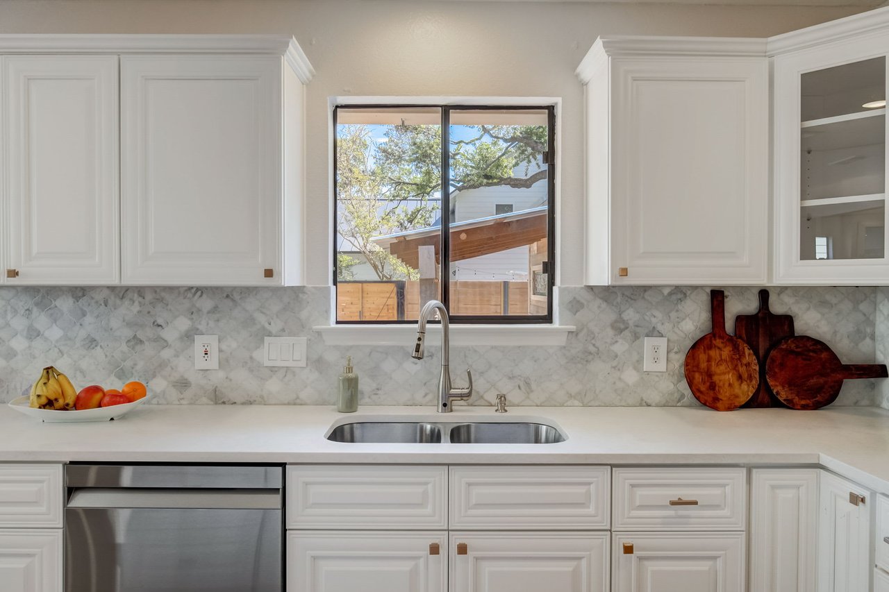 Charming Milwood Home: Updated Single-Story Gem with In-Law Plan & New Roof!
