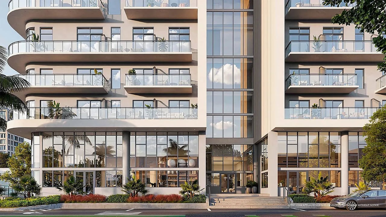 NoBe PARC residential building with curved glass balconies and a landscaped entrance.