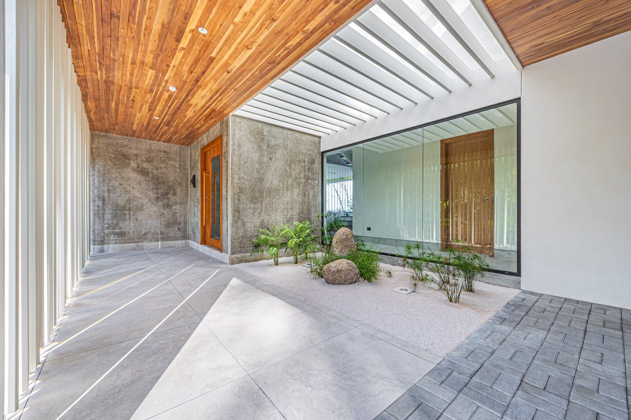 New contemporary tropical villa boasts with a movie theater and views of the iconic whale’s tail