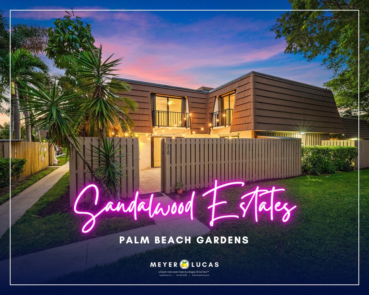Twilight exterior of 210 2nd Court, a two-story townhome with a fenced courtyard in Sandalwood Estates, Palm Beach Gardens