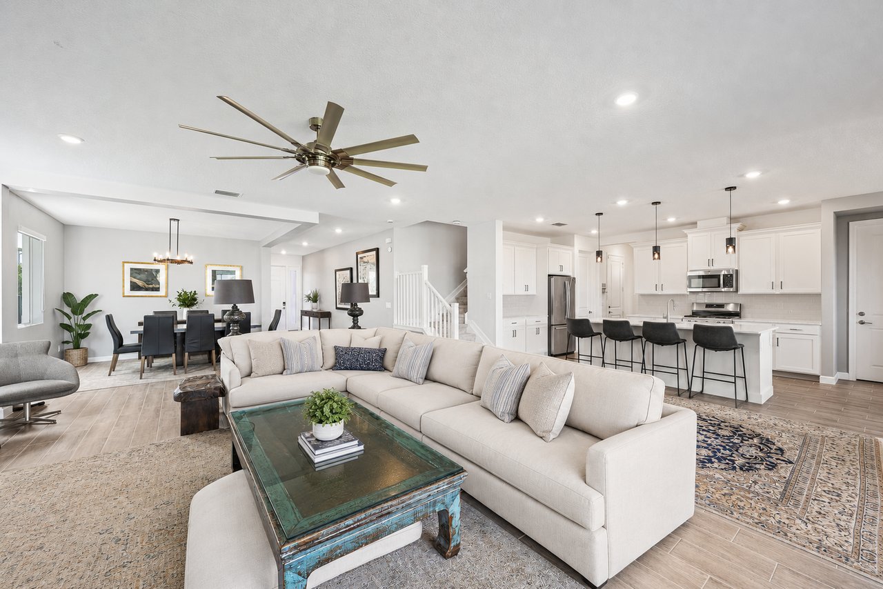 Beautiful exterior of a luxury family home in Arden featuring modern design, three-car garage, and spacious Florida living