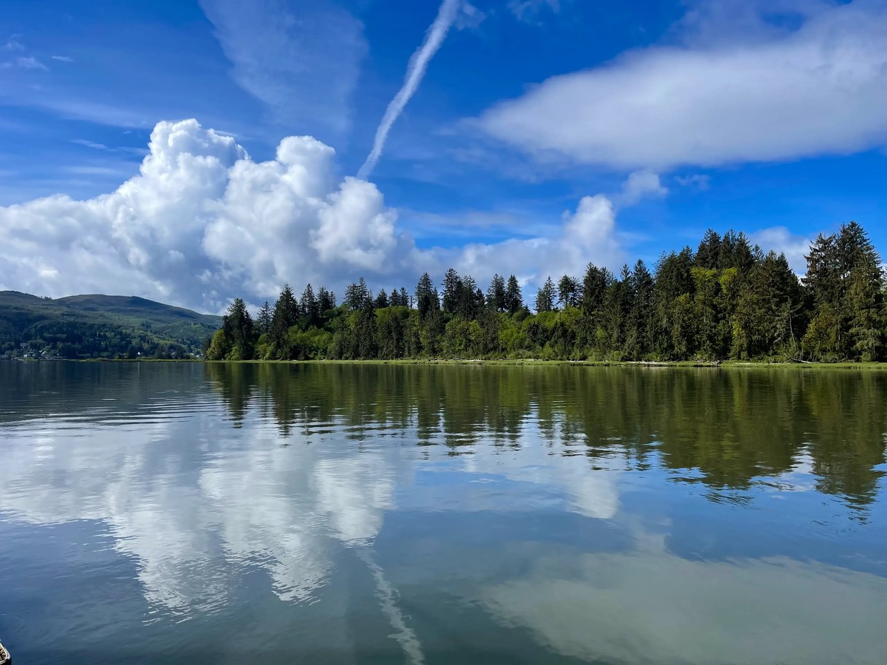 Nehalem Bay on a sunny day with the sky reflection the water