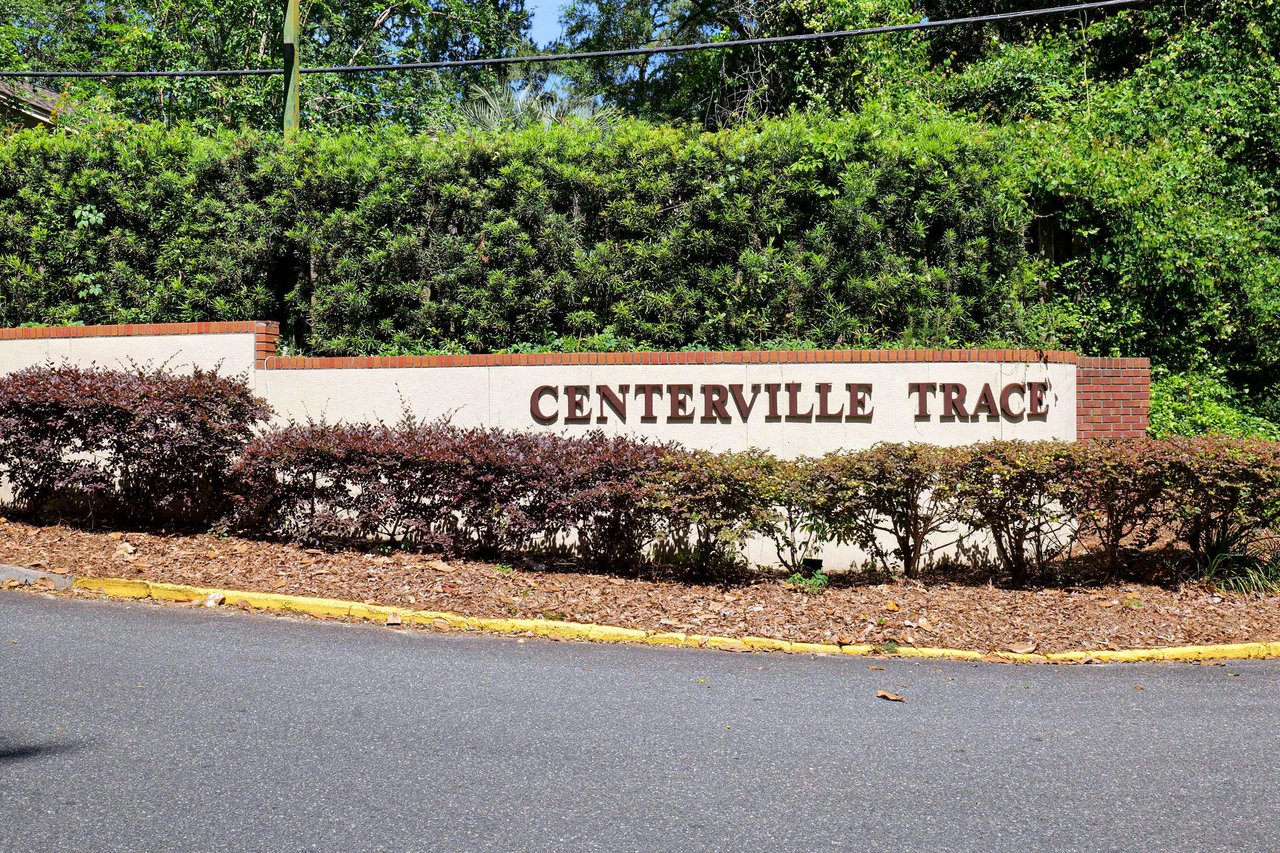 A ground-level view of the entrance sign for "Centerville Trace," indicating the name of the residential community.