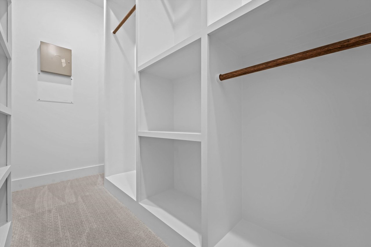 walk-in closet in a townhome model 