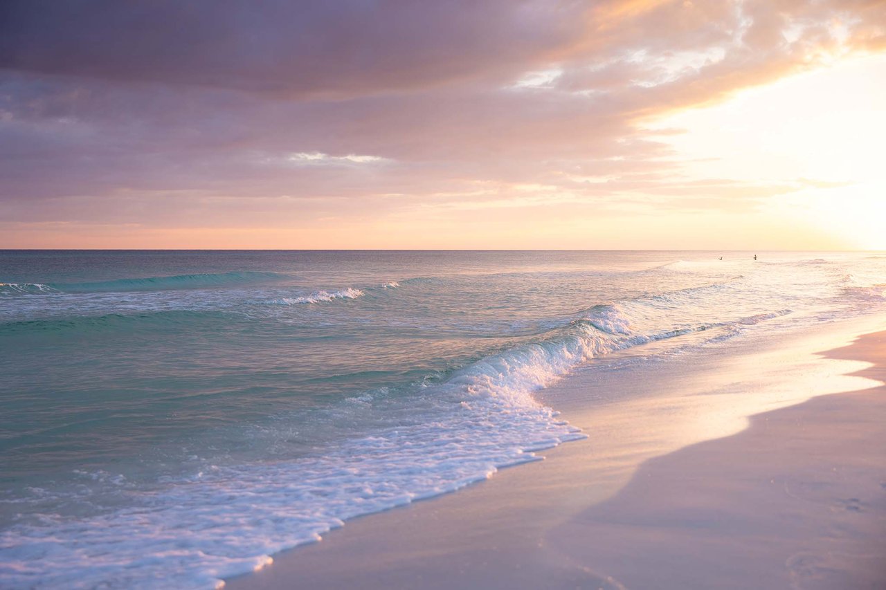 cotton candy colored sunset over emerald waters on 30A