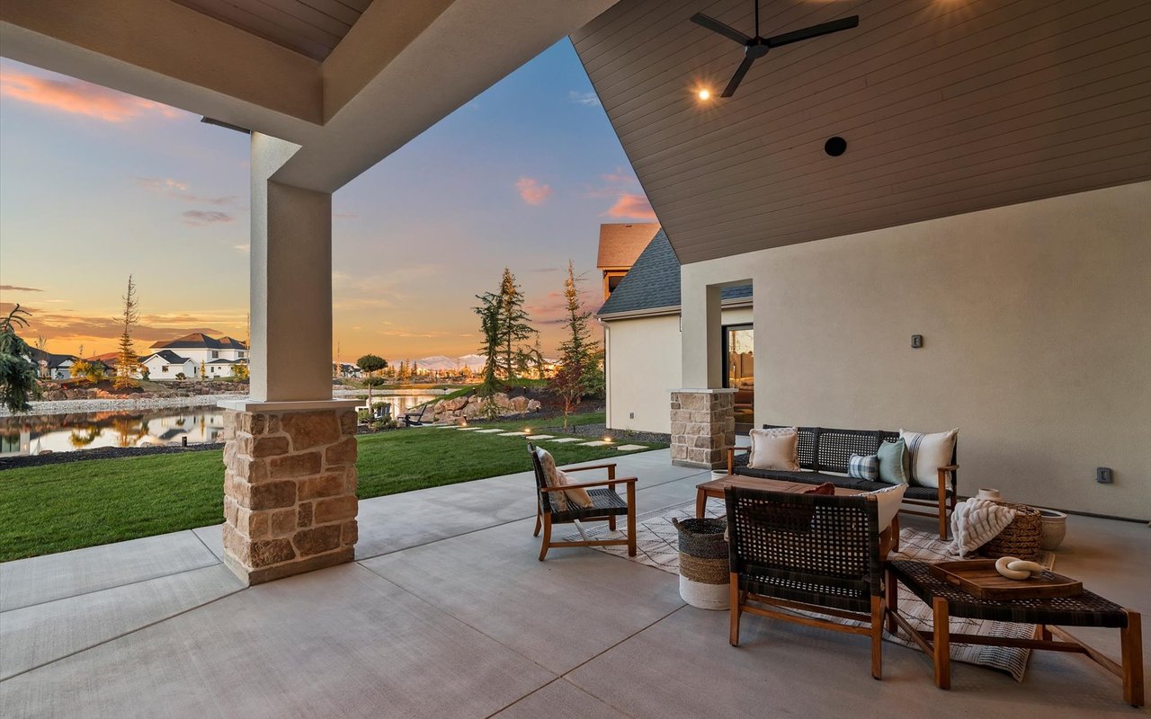 Covered back patio looking out towards the lake and mountains