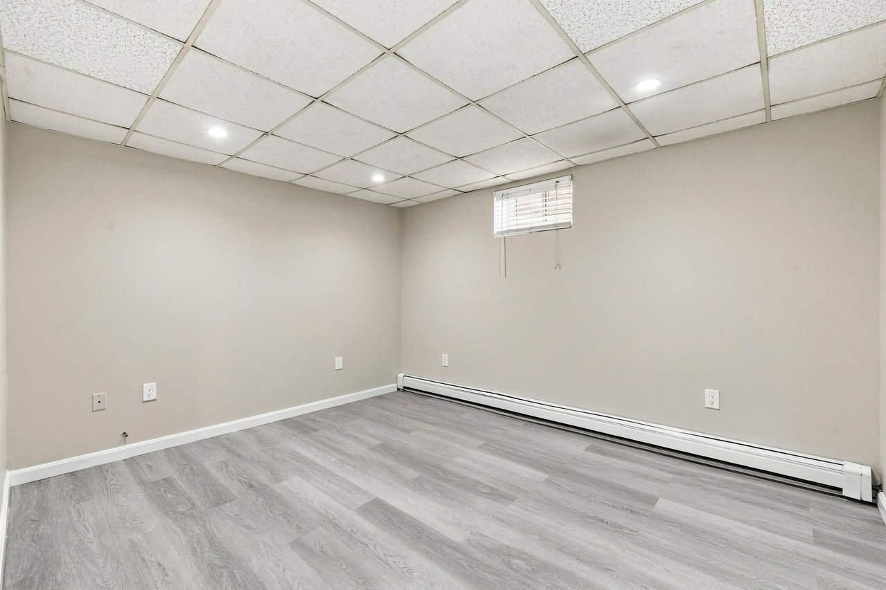 A Rare Two-Family Generational Asset with a Private Entrance to the Arnold Arboretum