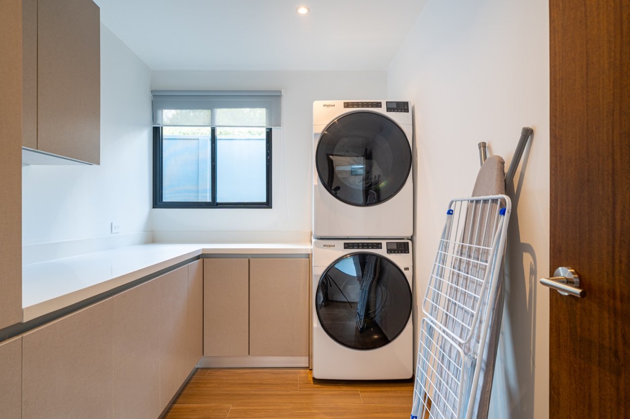 Stunning 3-Bedroom, 2.5-Bathroom Tropical Mid-Century Modern Home – Steps from the Beach