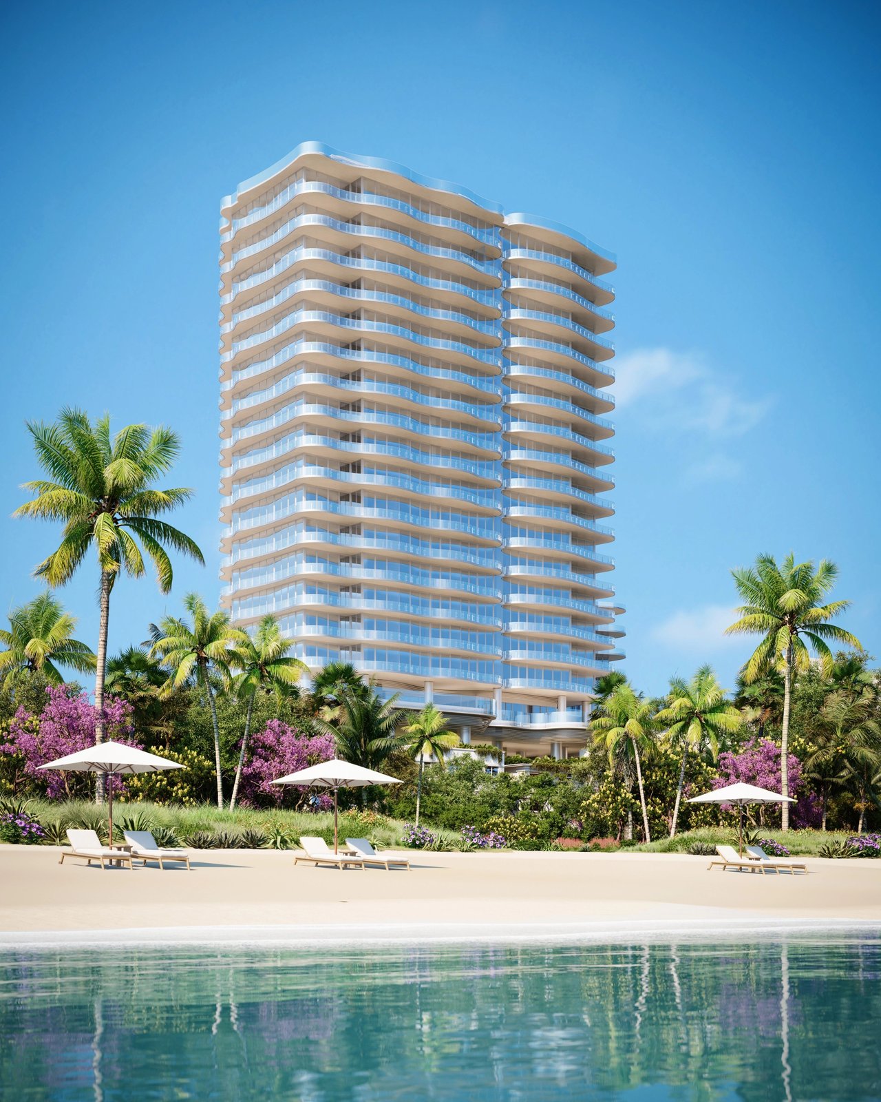 Ocean Terrace Residences high-rise with curved balconies overlooking a landscaped beach and calm water.