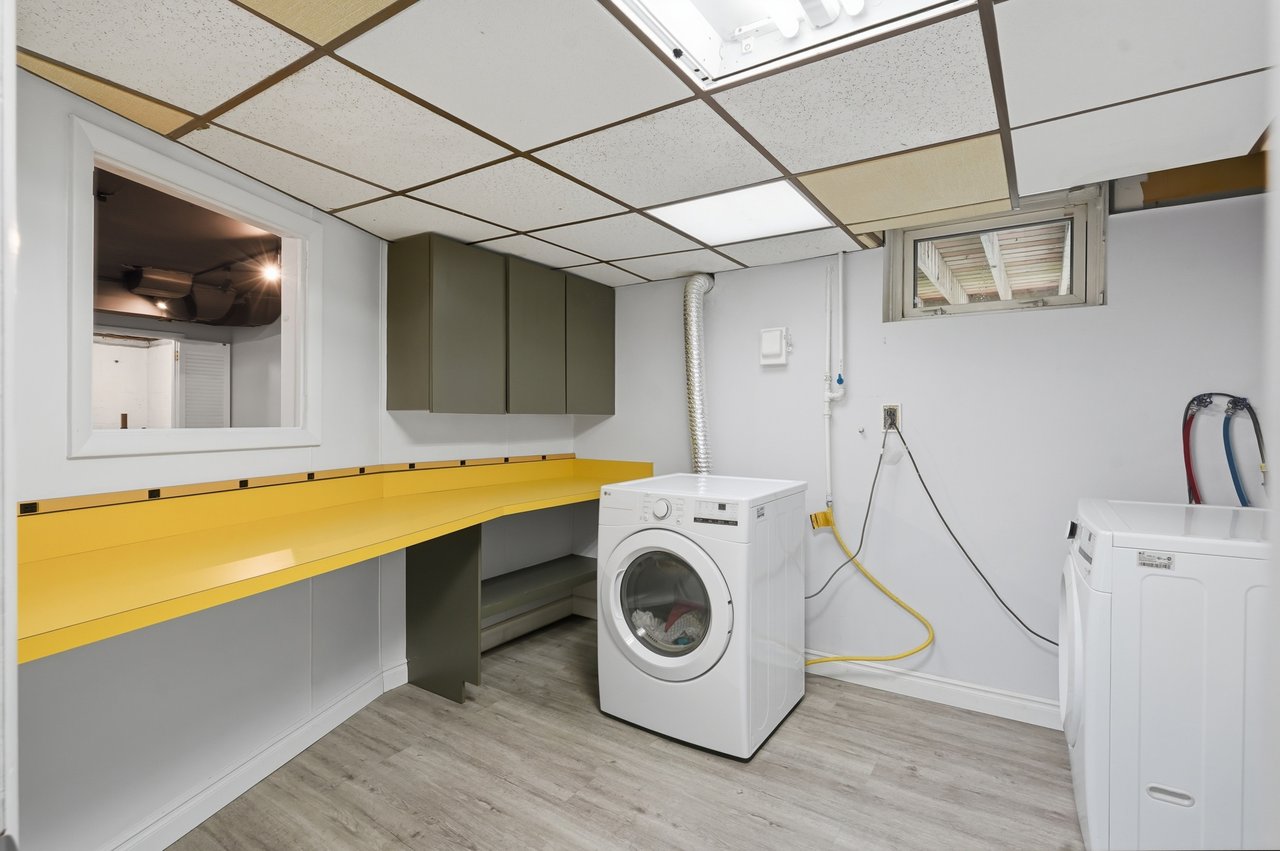 Featuring washer, dryer, storage space and counter for folding laundry
