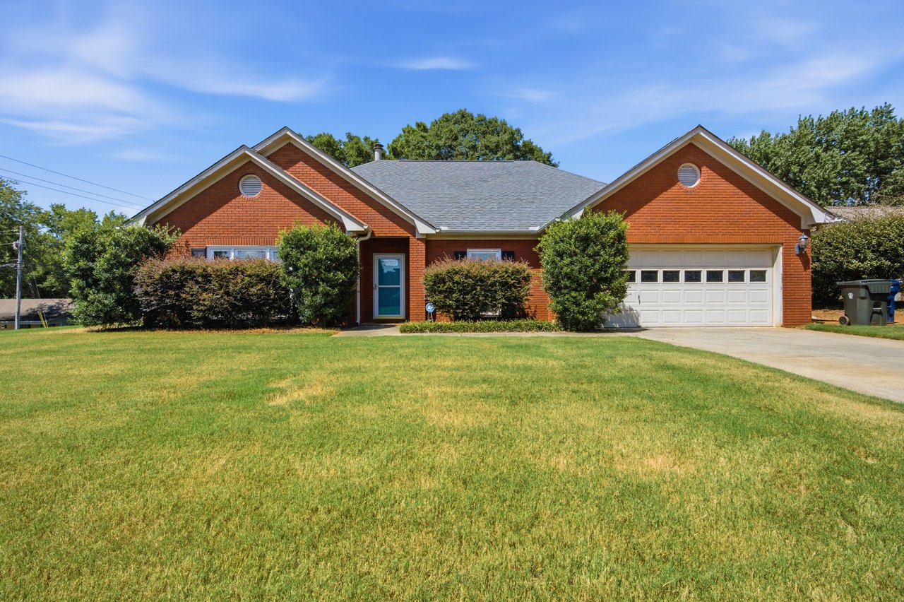 Full-Brick Beauty with Spacious Corner Lot & Private Fenced Backyard