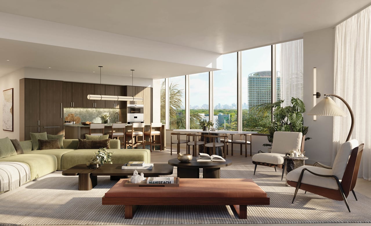 Open-plan living room and kitchen with floor-to-ceiling windows and a distant city skyline.