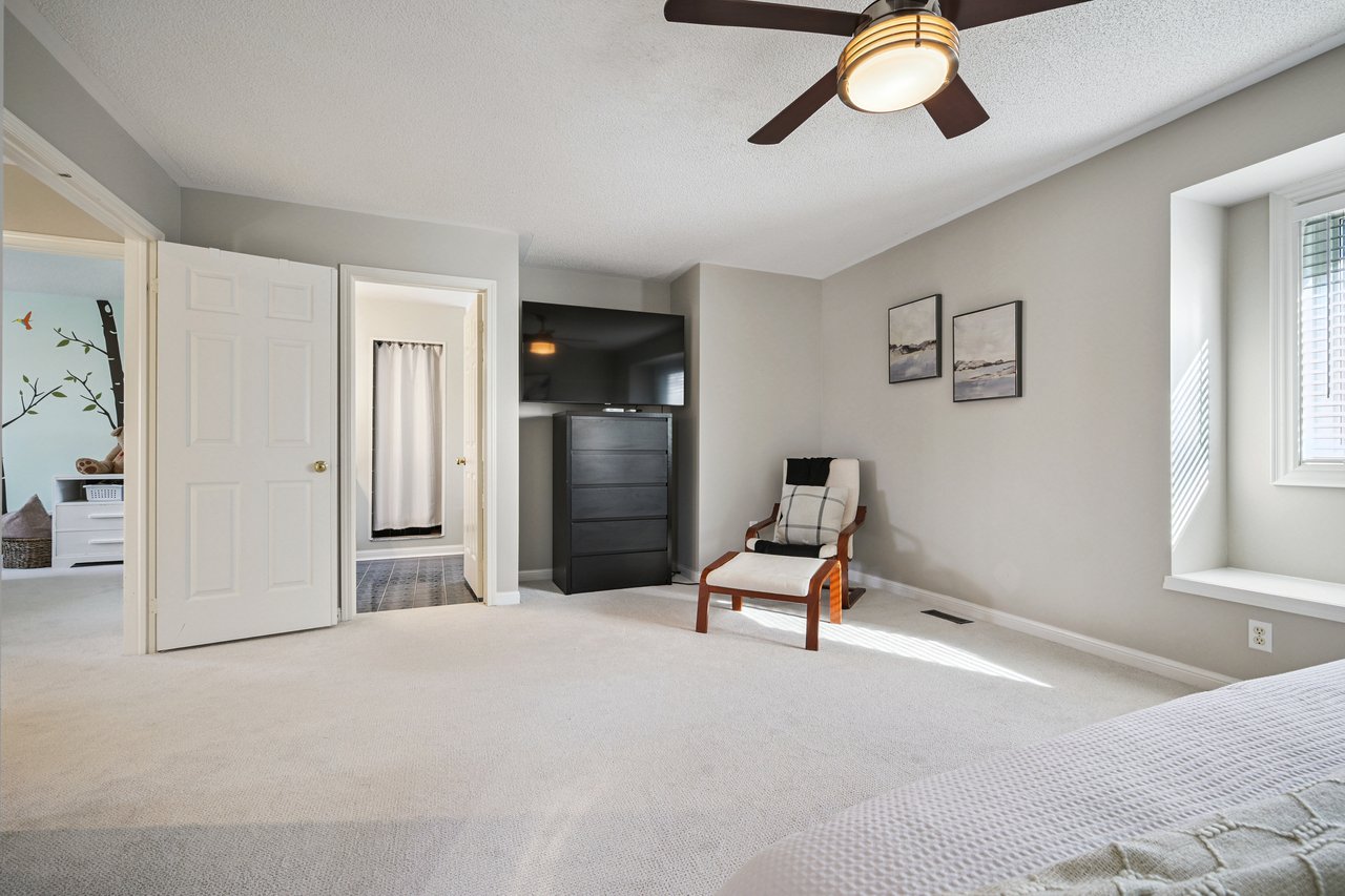 Sun-Filled Sophistication on a Rare Pie-Shaped Lot in West Oak Trails