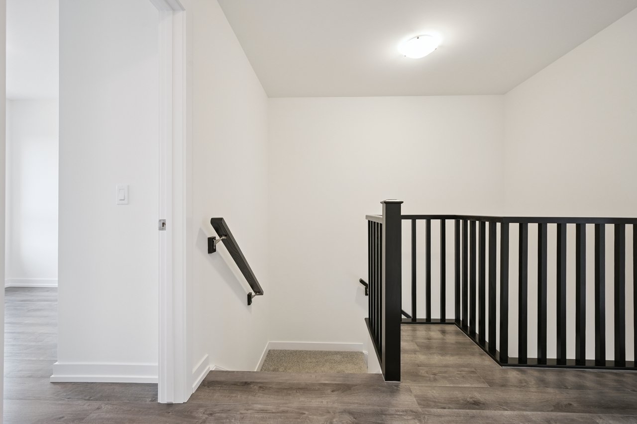 Brand-new, never-lived-in stacked townhome