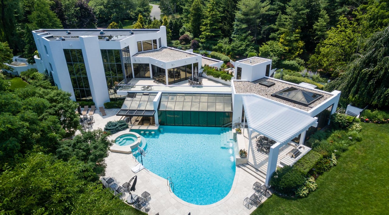 White mansion with pool