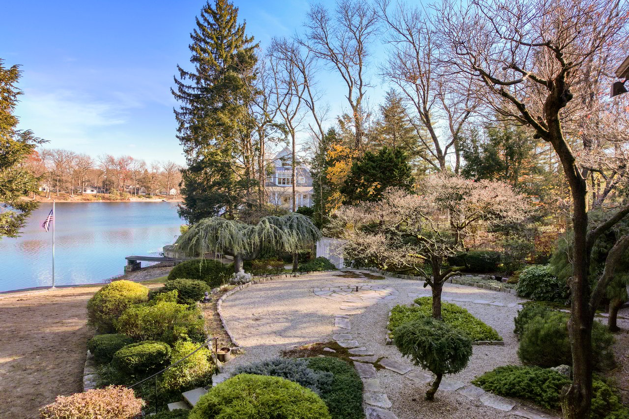 Your Lakeside Paradise: Exquisite Mid-Century Ranch Home with Private Beach on Wood Pond Lake, West Hartford CT