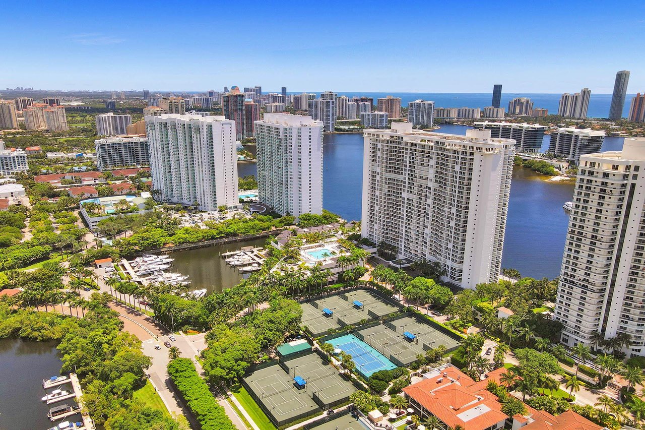 Aerial view of Williams Island and The Peninsula in Aventura, showcasing luxury waterfront homes