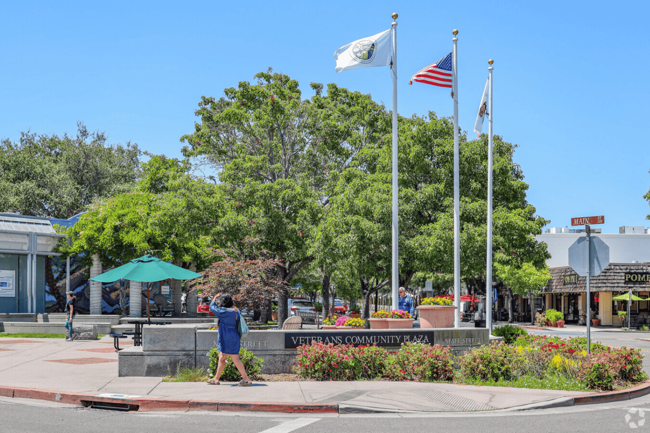 Veterans Community Plaza in downtown Los Altos with American flag blowing in the wind