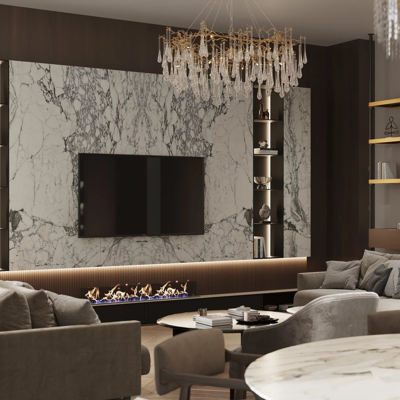 Luxury living room with a veined marble wall, linear fireplace, crystal chandelier, and plush seating.