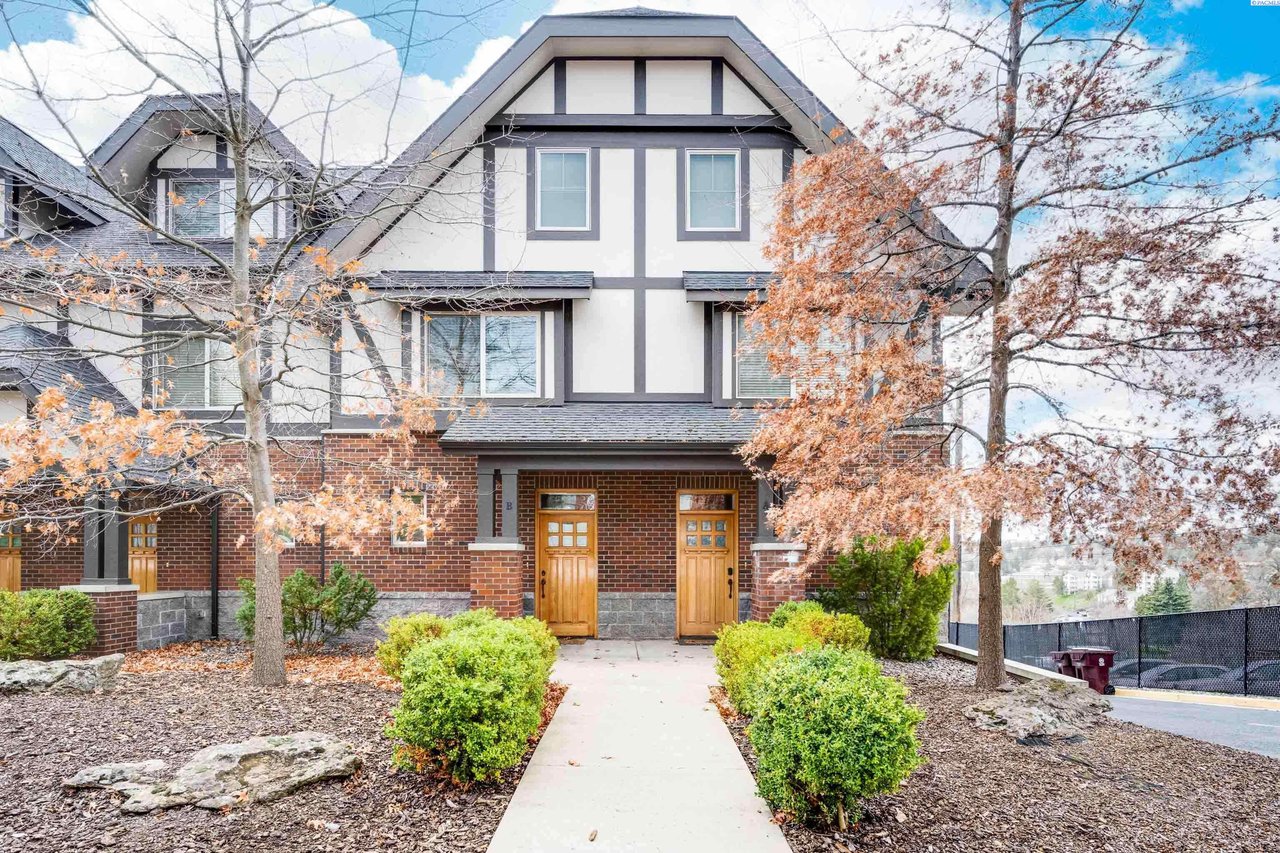 Tudor-style condominium at 715 NE Oak Street Condo B in Pullman WA near Washington State University with an attached 2-car garage.