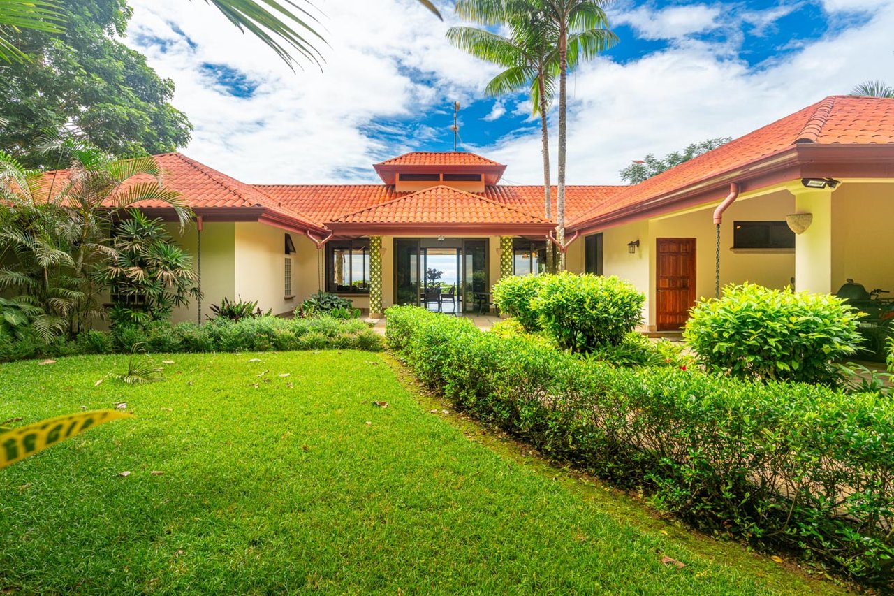 Ocean, jungle & mountain views on a meticulously landscaped 3-home family compound