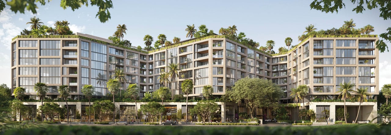 The Well residential development in Coconut Grove, a landscaped contemporary mid-rise with balconies.
