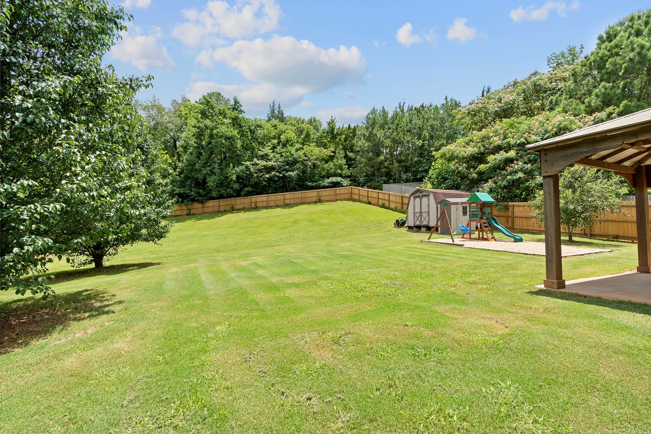 LOTS of Space both Inside and Outside!! Large Fenced in Backyard!
