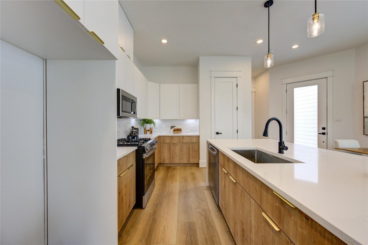 kitchen of homes in the villas at tuam in Houston