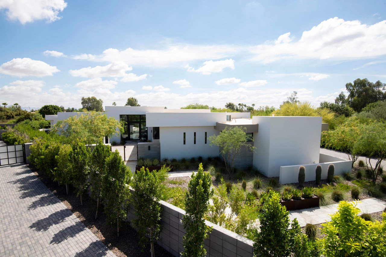 Driveway and entry of secluded modern home