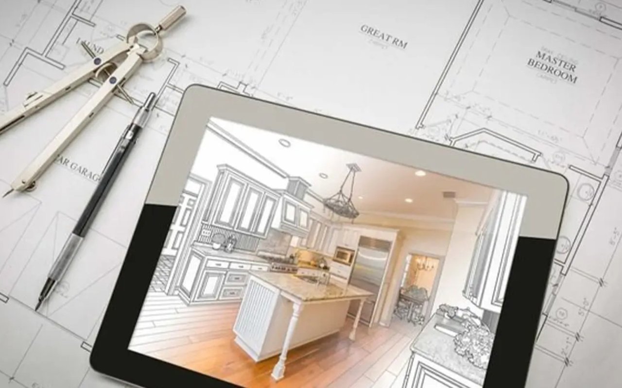 Kitchen renovation design on a tablet, with white cabinets, a large island, and warm wood flooring.