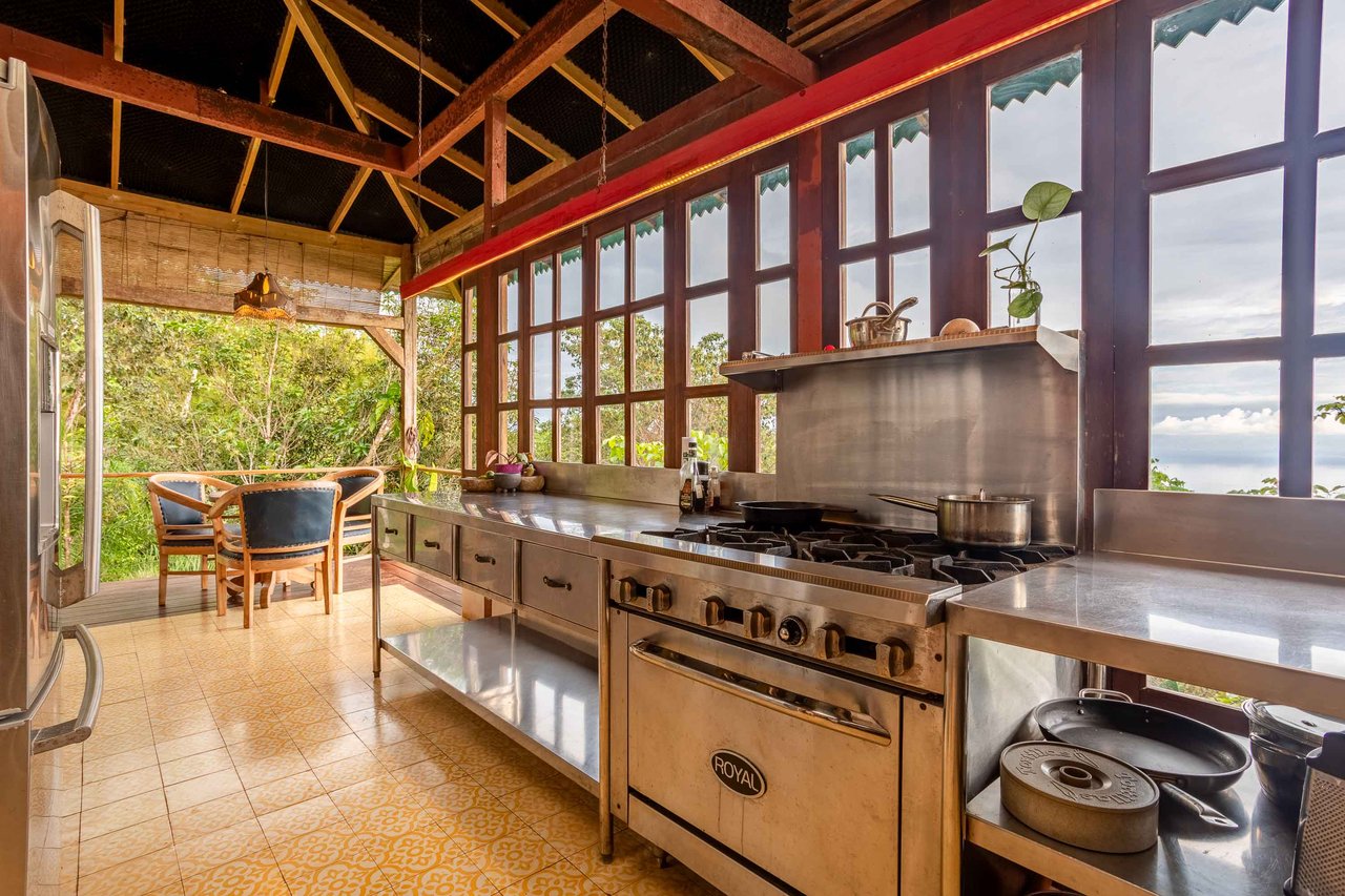 A Handcrafted Residence Immersed in Nature Above the Canopy Ocean View Architectural Home